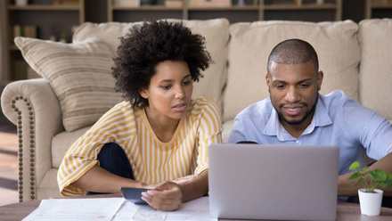 iStock-1351333940 couple laptop calculator.jpg
