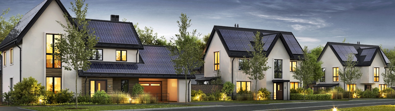 row of houses in the uk with solar panels on their roofs
