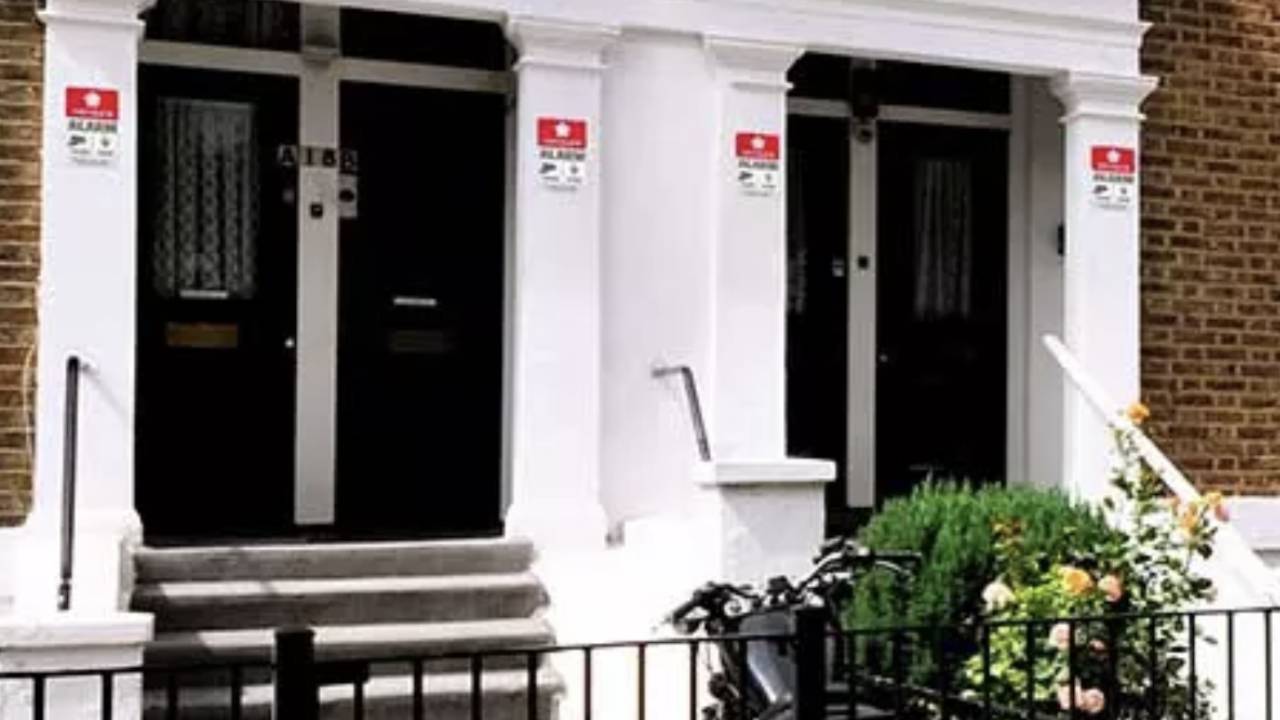 traditional houses with Verisure deterrent labels on outside